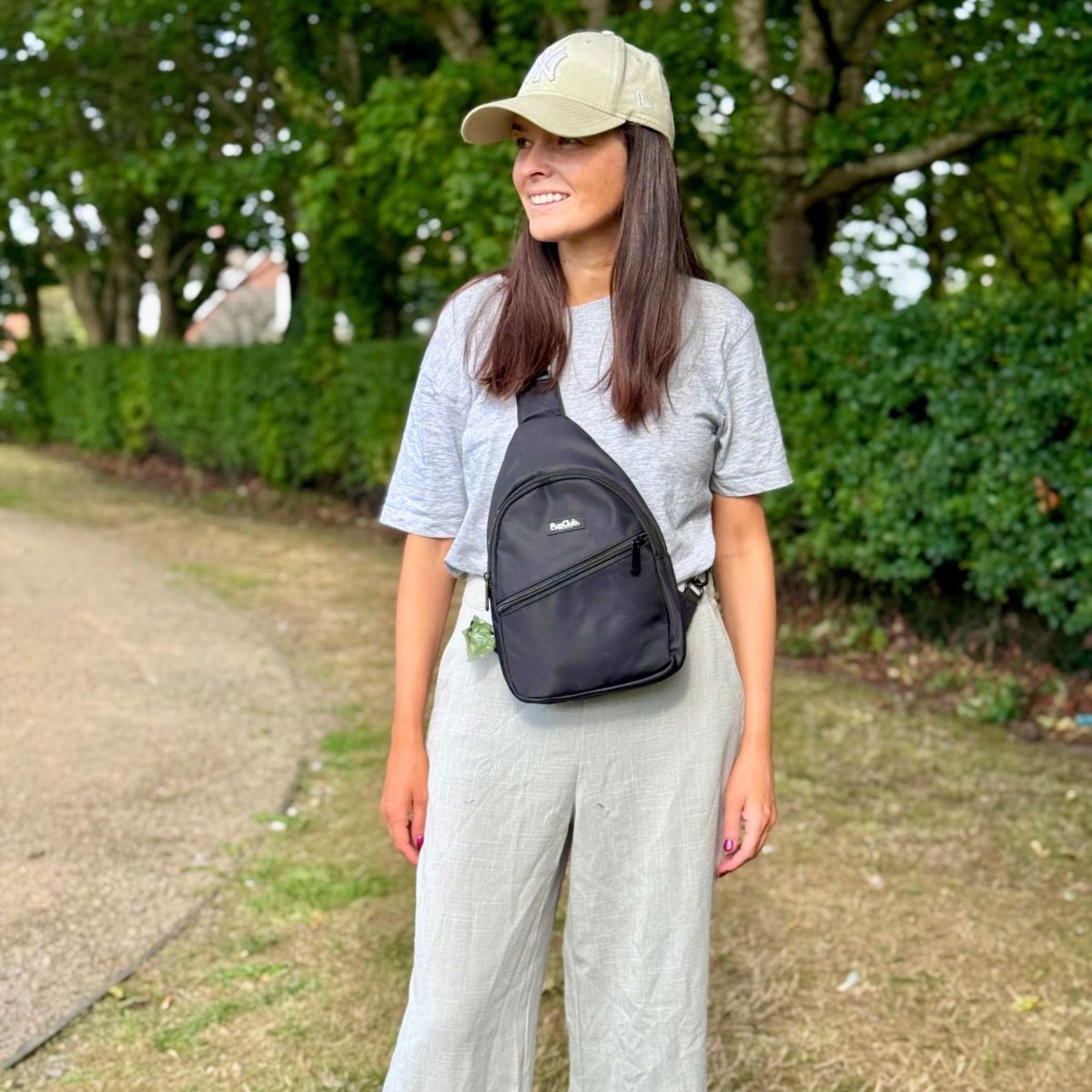 Woman Wearing Sling Dog Walking Bag Backpack - Black - Pupclub Couture