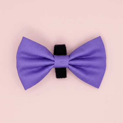 Purple dog bow tie with velcro band on a light pink background - Pupclub Couture